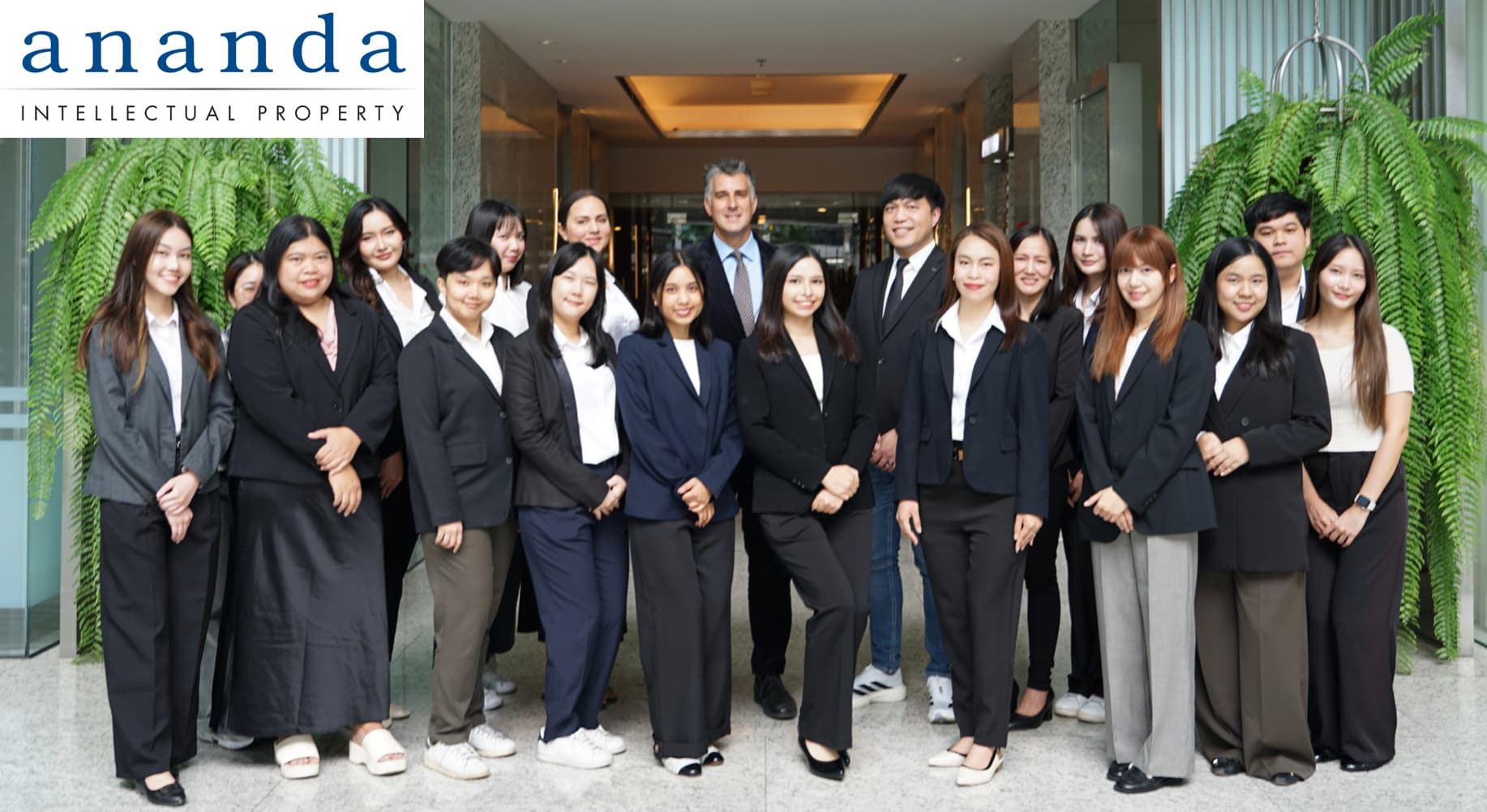 Ananda IP team of trademark and patent attorneys in front of our office entrance